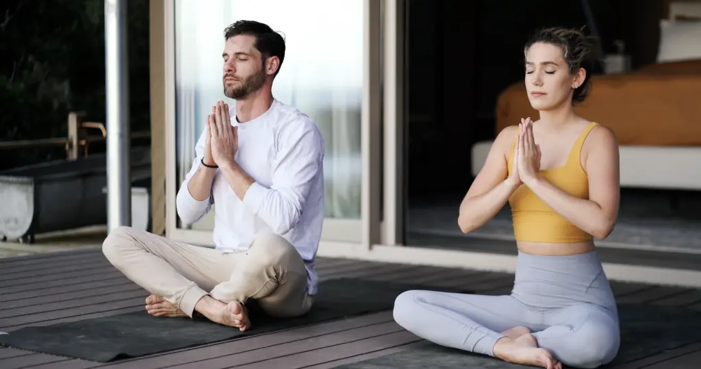 couple doing yoga